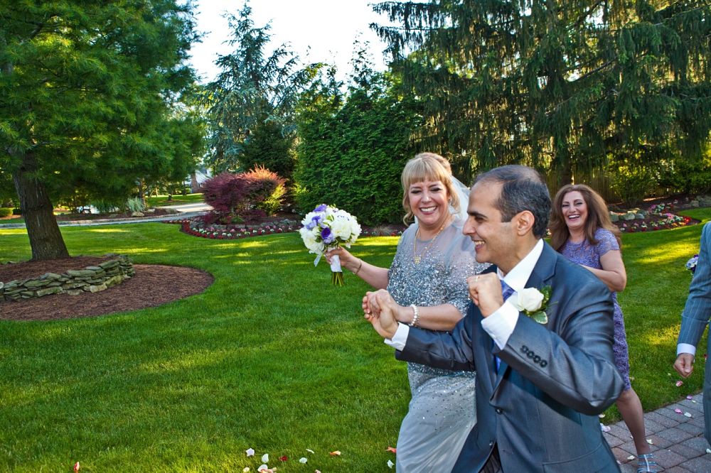 Donna and Sharbel Walking at Wedding